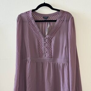 Torrid blouse with sheer sleeves. Beautiful cut. Great for summer or fall & work